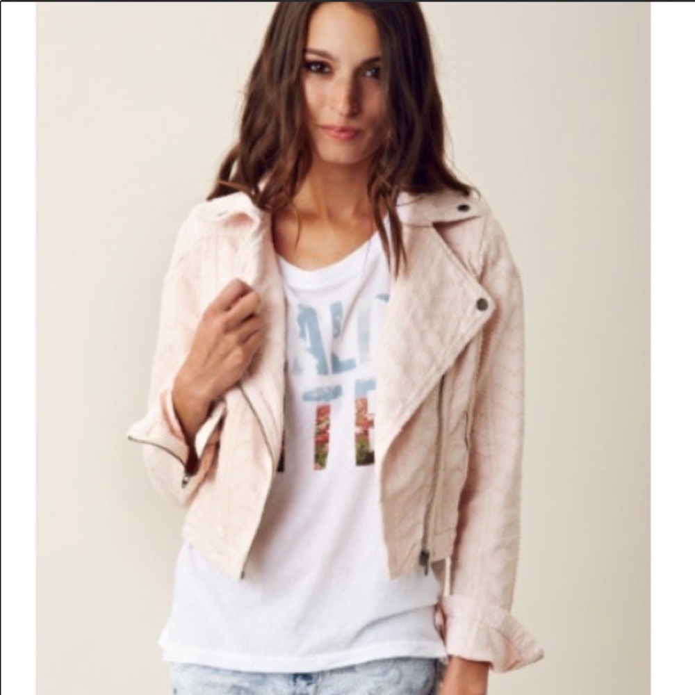 Free People faded denim moto jacket.